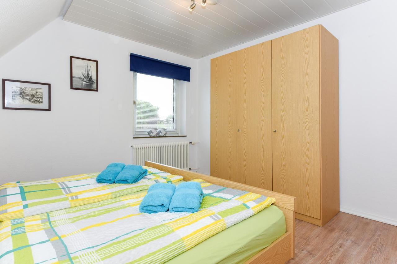 Ferienwohnungen Im Haus Waterkant Neuharlingersiel Exterior foto